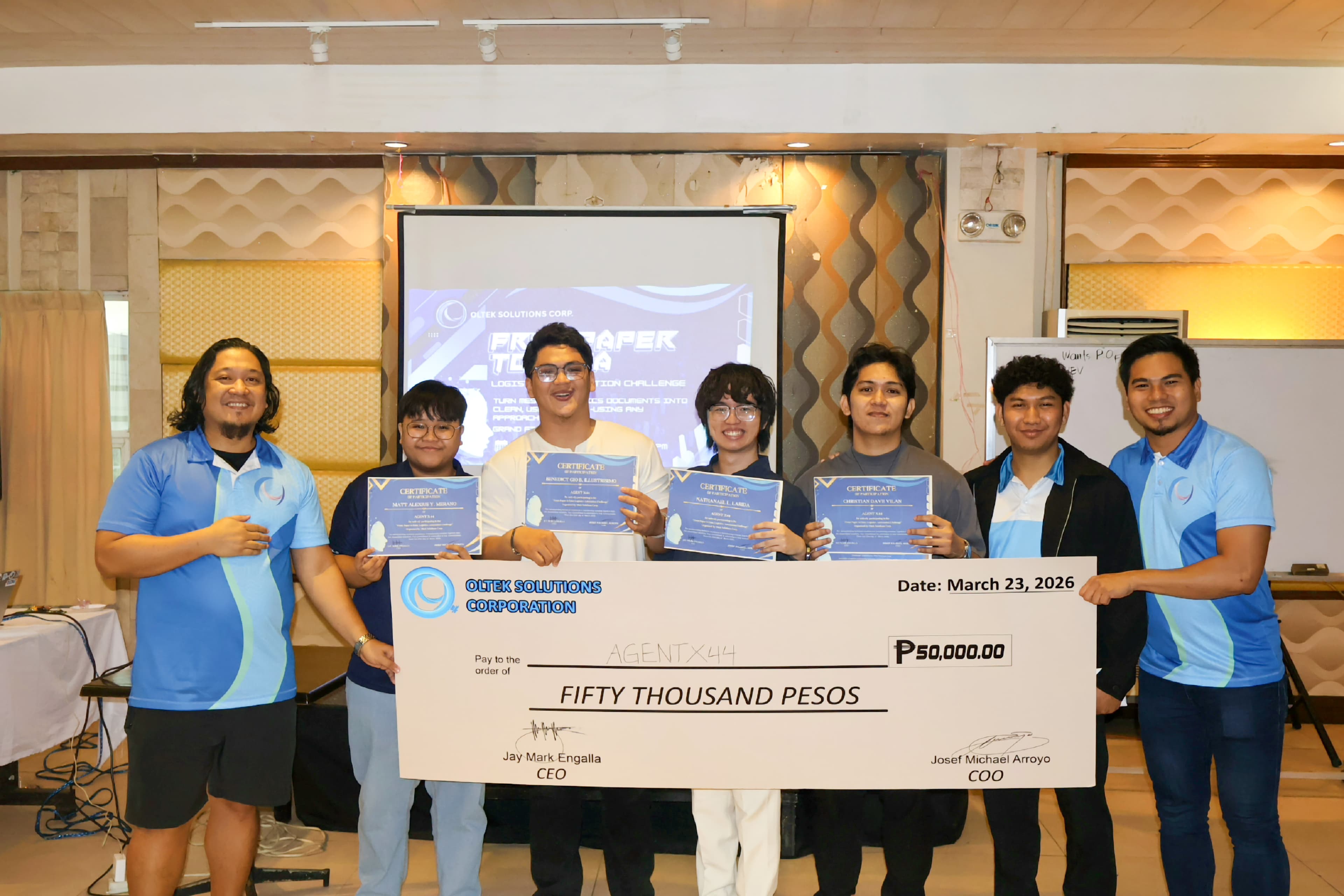 From Paper to Data champions holding their certificates and prize cheque