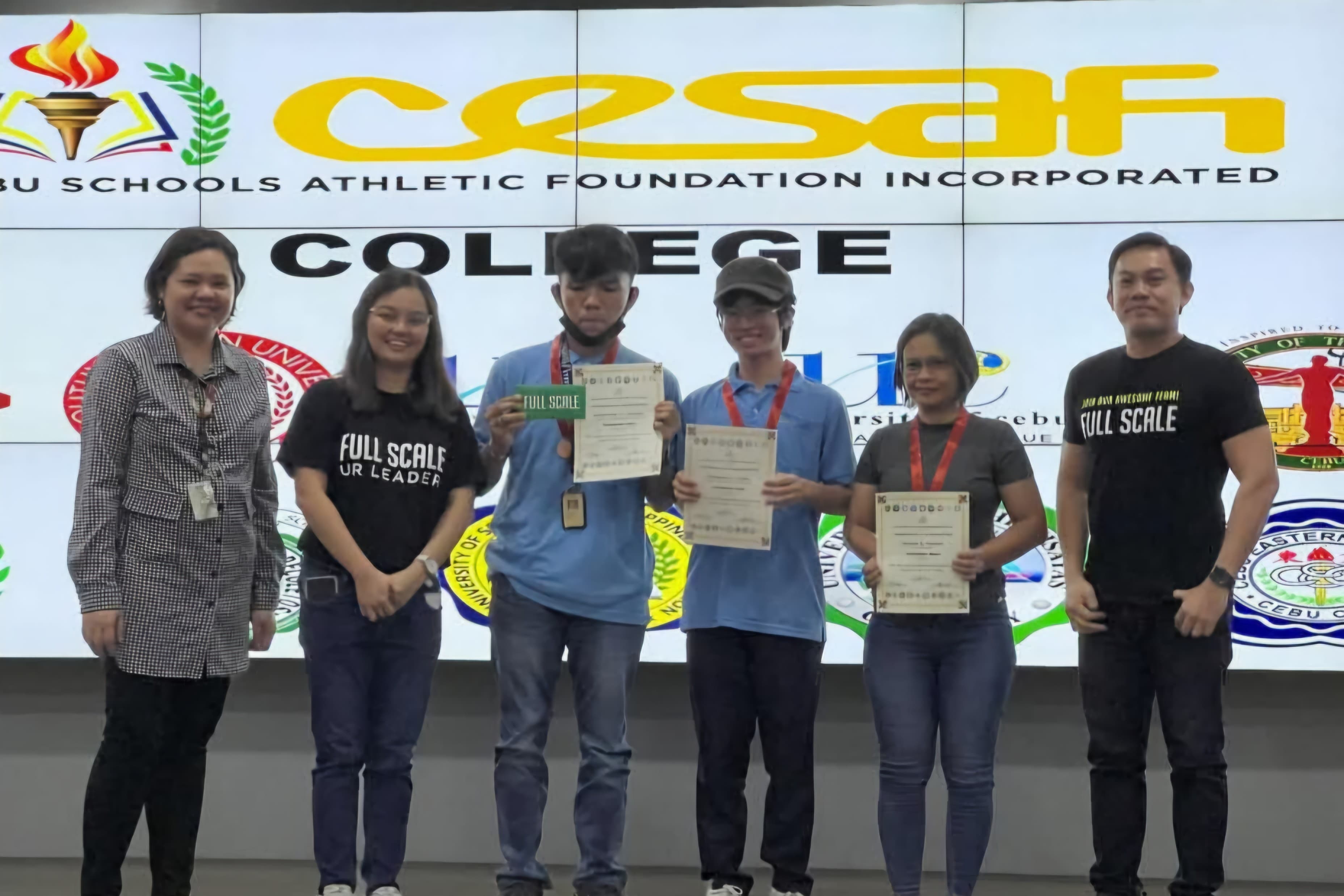 CESAFI Computer Quiz awardees holding certificates with faculty members