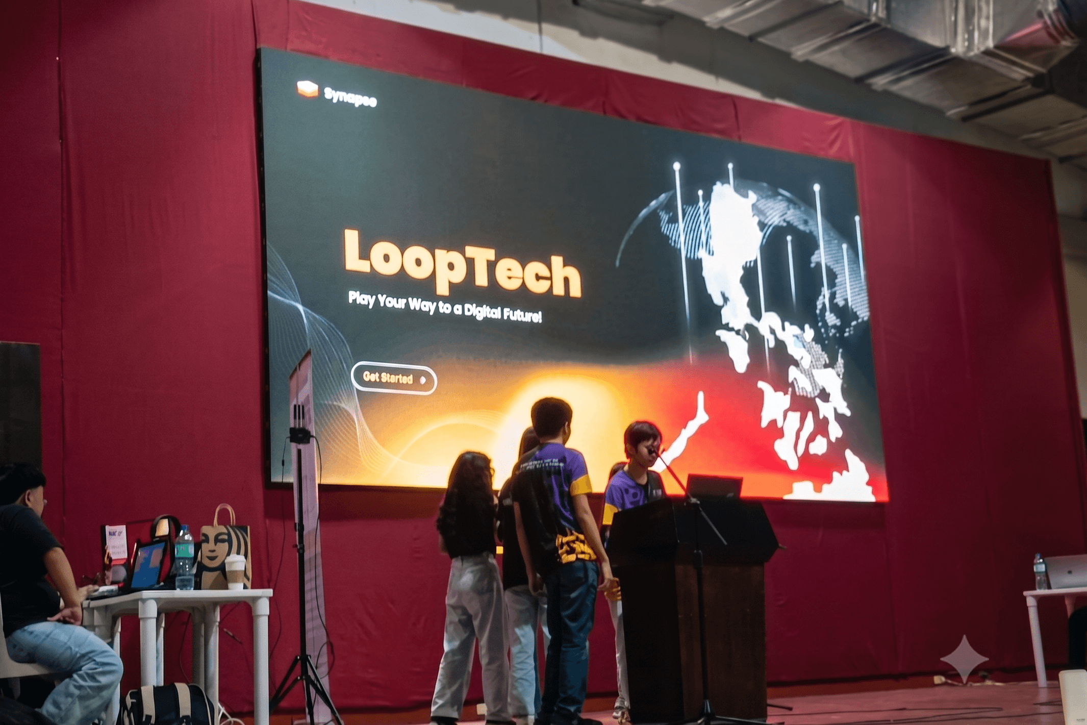 LoopTech team presenting its Play Your Way to a Digital Future concept at the IBPAP hackathon